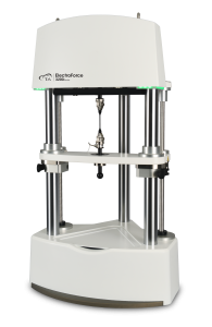 Figure 1. ElectroForce® 3200 Test Instrument show with Tensile Grips and Specimen