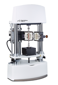 Figure 1. ElectroForce DMA 3200 instrument equipped with a forced-convection oven and tensile testing fixtures